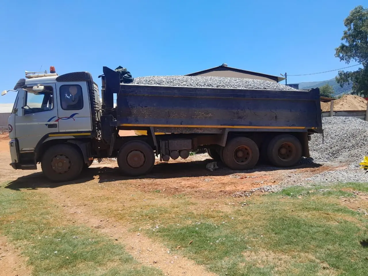Linda’s General tipper truck loaded with crushed stone